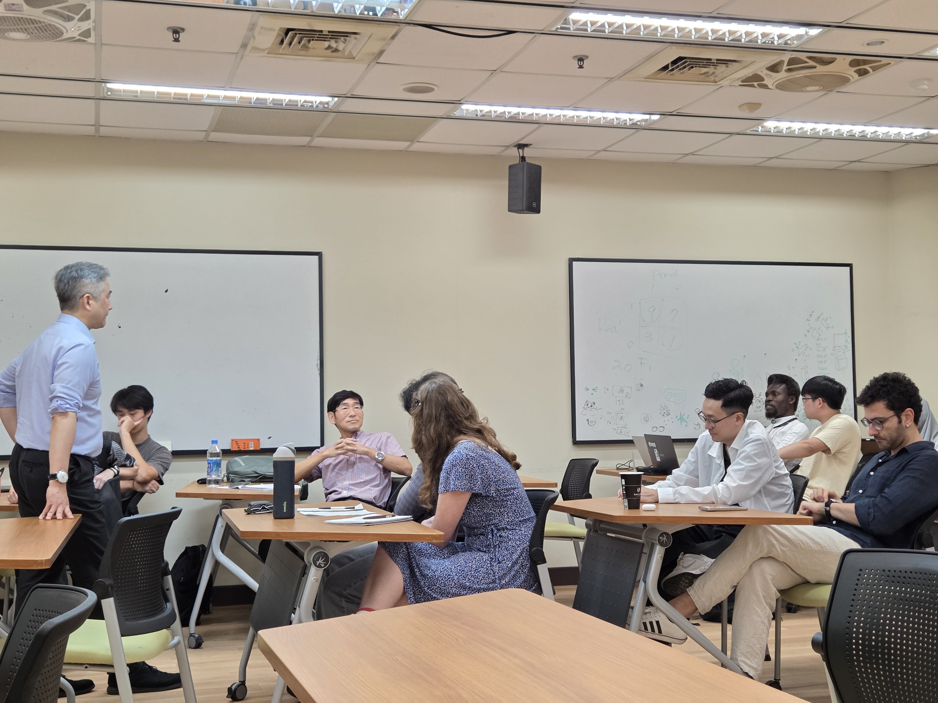 Students and faculty members listened attentively as Rear Admiral Philip W. Yu discussed the parallels between Ukraine and Taiwan, emphasizing the importance of identity, political will, and national 